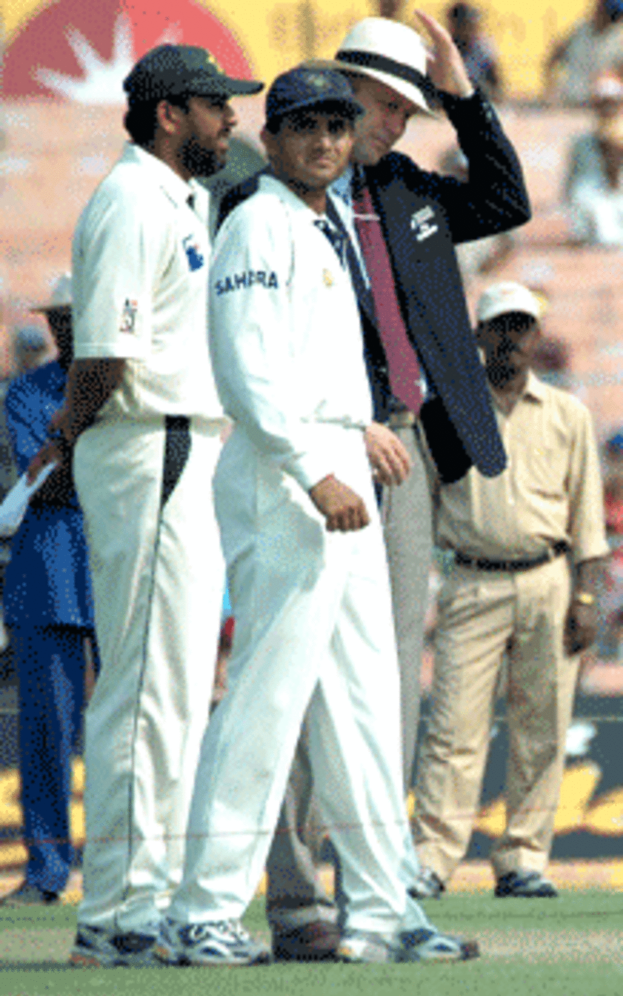 Indian captain Sourav Ganguly and his Pakistan counterpart Inzamam-ul-Haq at the toss before the start of the second test. Overseeing the toss is the former England batsman and ICC Match Referee Chris Broad, 2nd Test: India v Pakistan at Kolkata, 16-20 Mar 2005