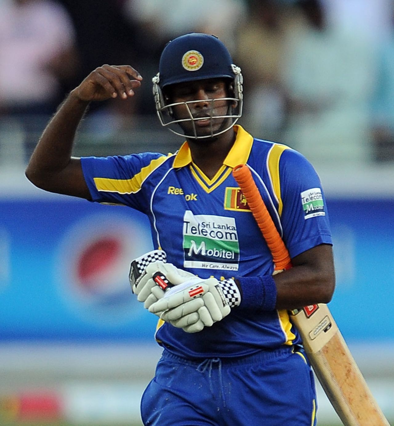 Angelo Mathews walks back after being caught short of the crease, Pakistan v Sri Lanka, 1st ODI, Dubai, November 11, 2011 