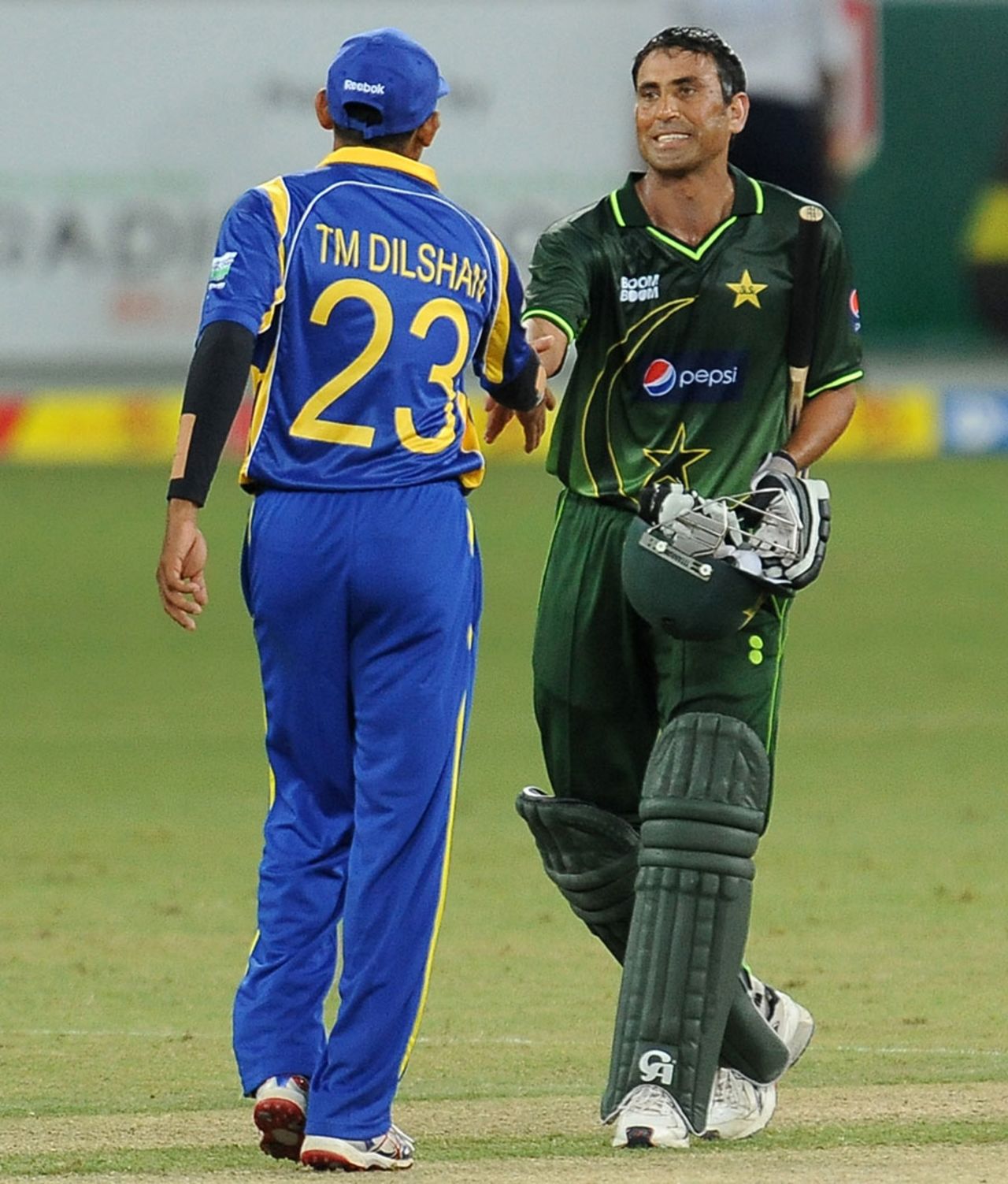Younis Khan and Tillakaratne Dilshan shake hands after the early finish, Pakistan v Sri Lanka, 1st ODI, Dubai, November 11, 2011 