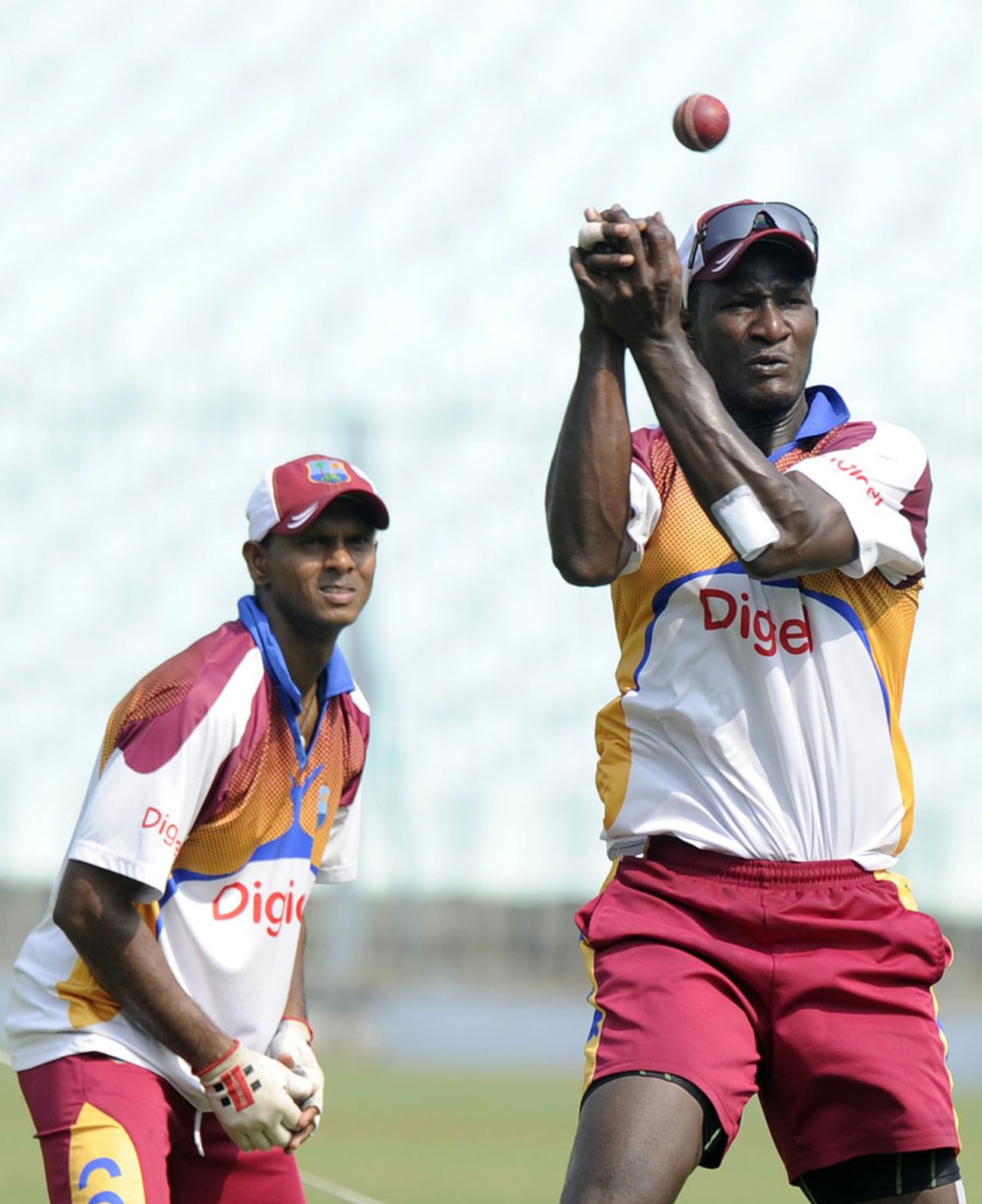 Shivnarine Chanderpaul and Darren Sammy hone their fielding skills, Kolkata, November 12, 2011