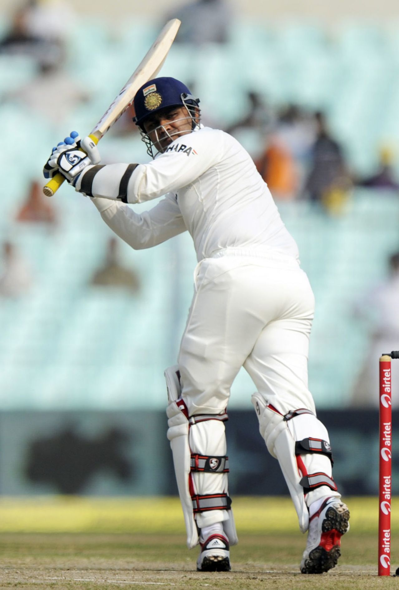 Virender Sehwag flicks the ball down the legside, India v West Indies, 2nd Test, Kolkata, 1st day, November 14, 2011