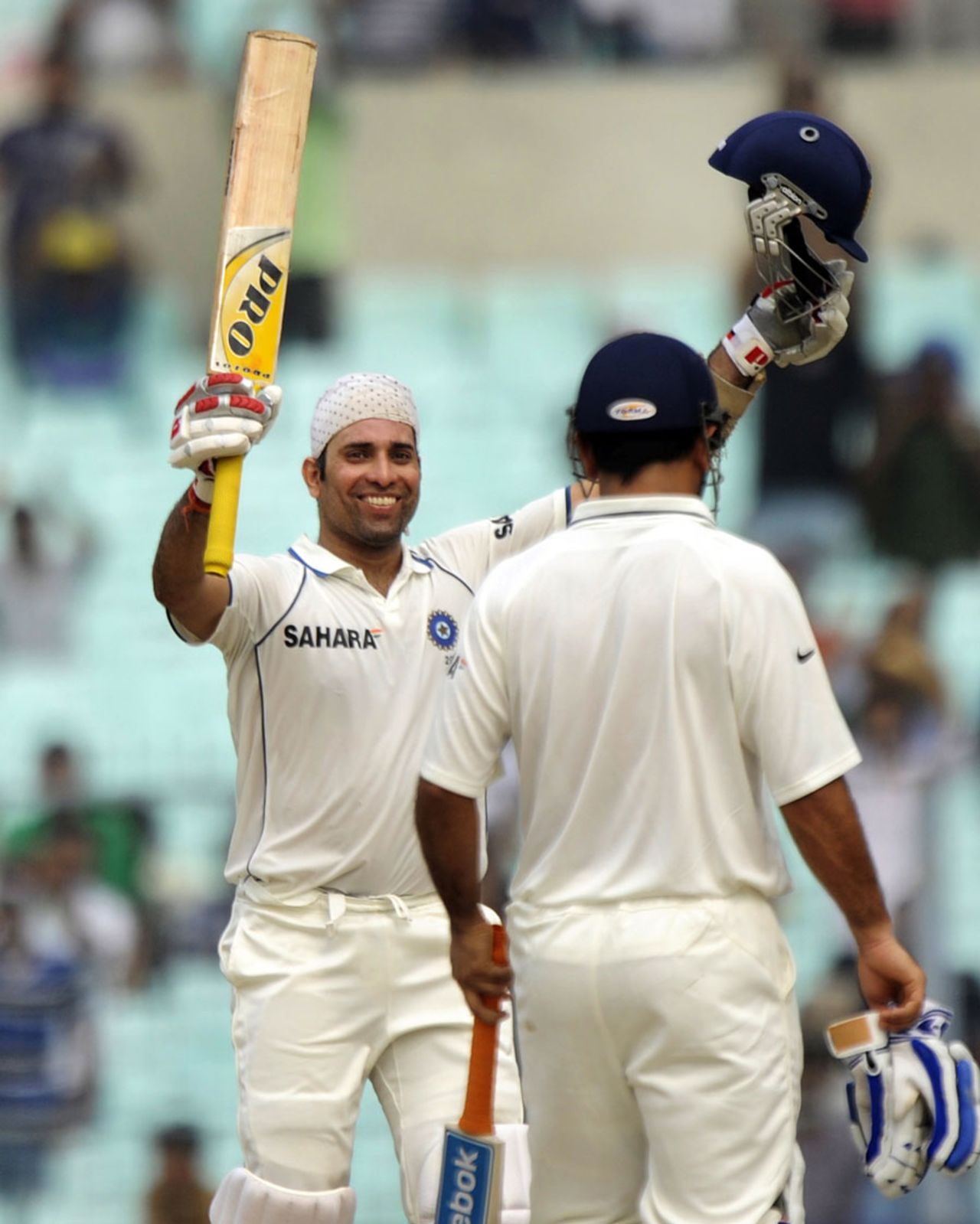 VVS Laxman is all smiles after reaching his hundred, India v West Indies, 2nd Test, Kolkata, 2nd day, November 15, 2011