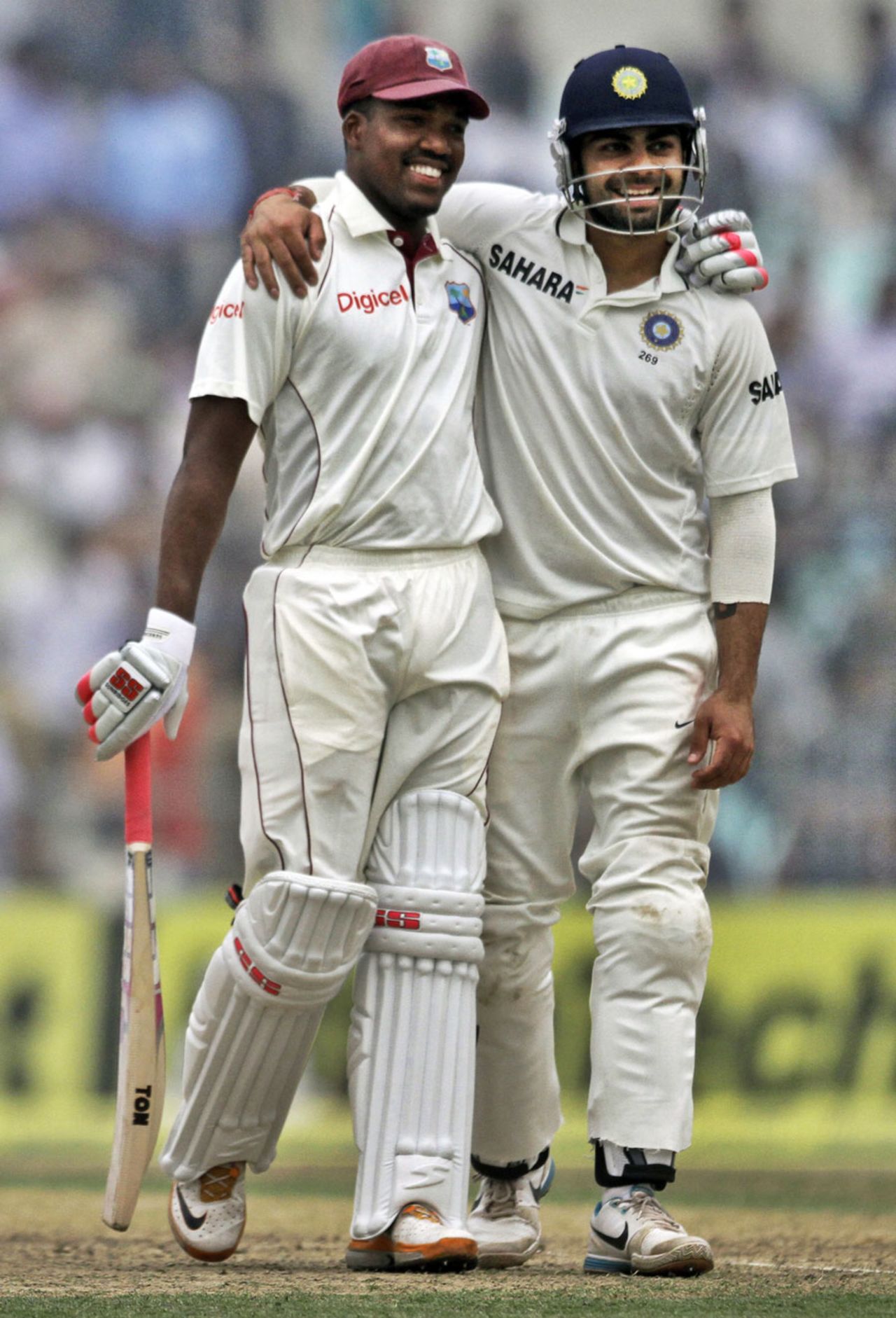 Darren Bravo and Virat Kohli share a light moment, India v West Indies, 2nd Test, Kolkata, 2nd day, November 15, 2011