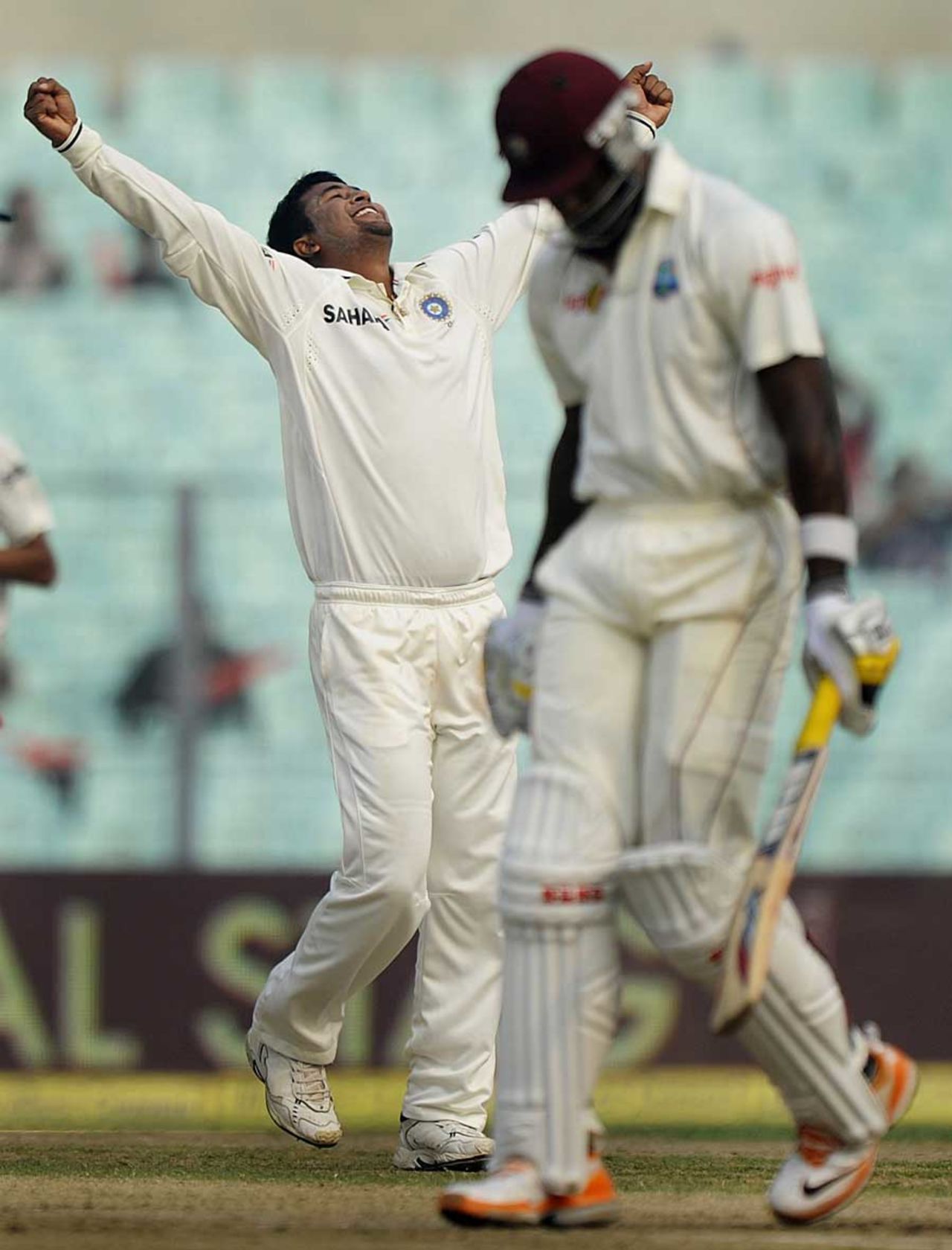 Pragyan Ojha celebrates the fall of Kirk Edwards, India v West Indies, 2nd Test, Kolkata, 3rd day, November 16, 2011