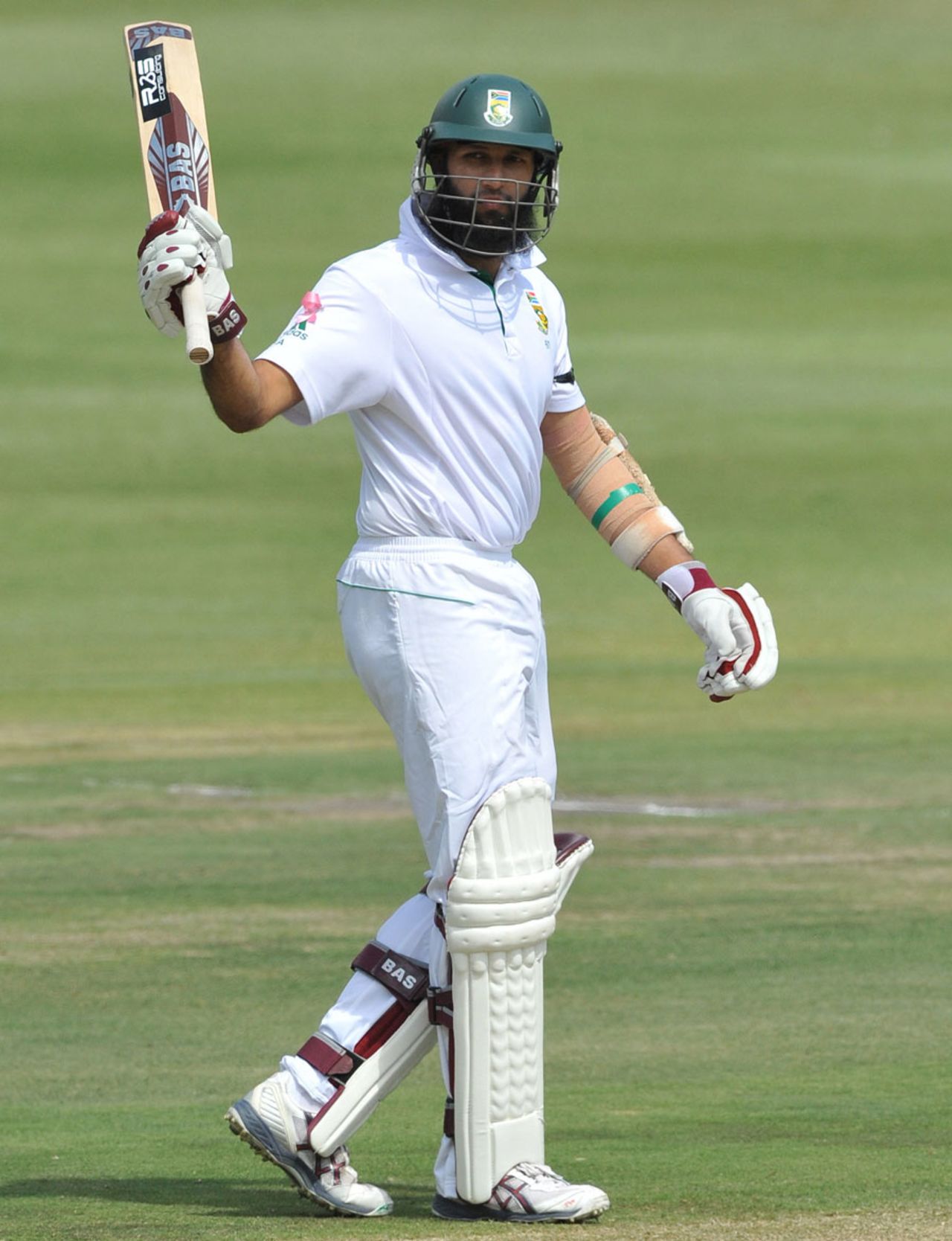 Hashim Amla raises his bat after reaching a half-century, South Africa v Australia, 2nd Test, Johannesburg, 3rd day, November 19, 2011
