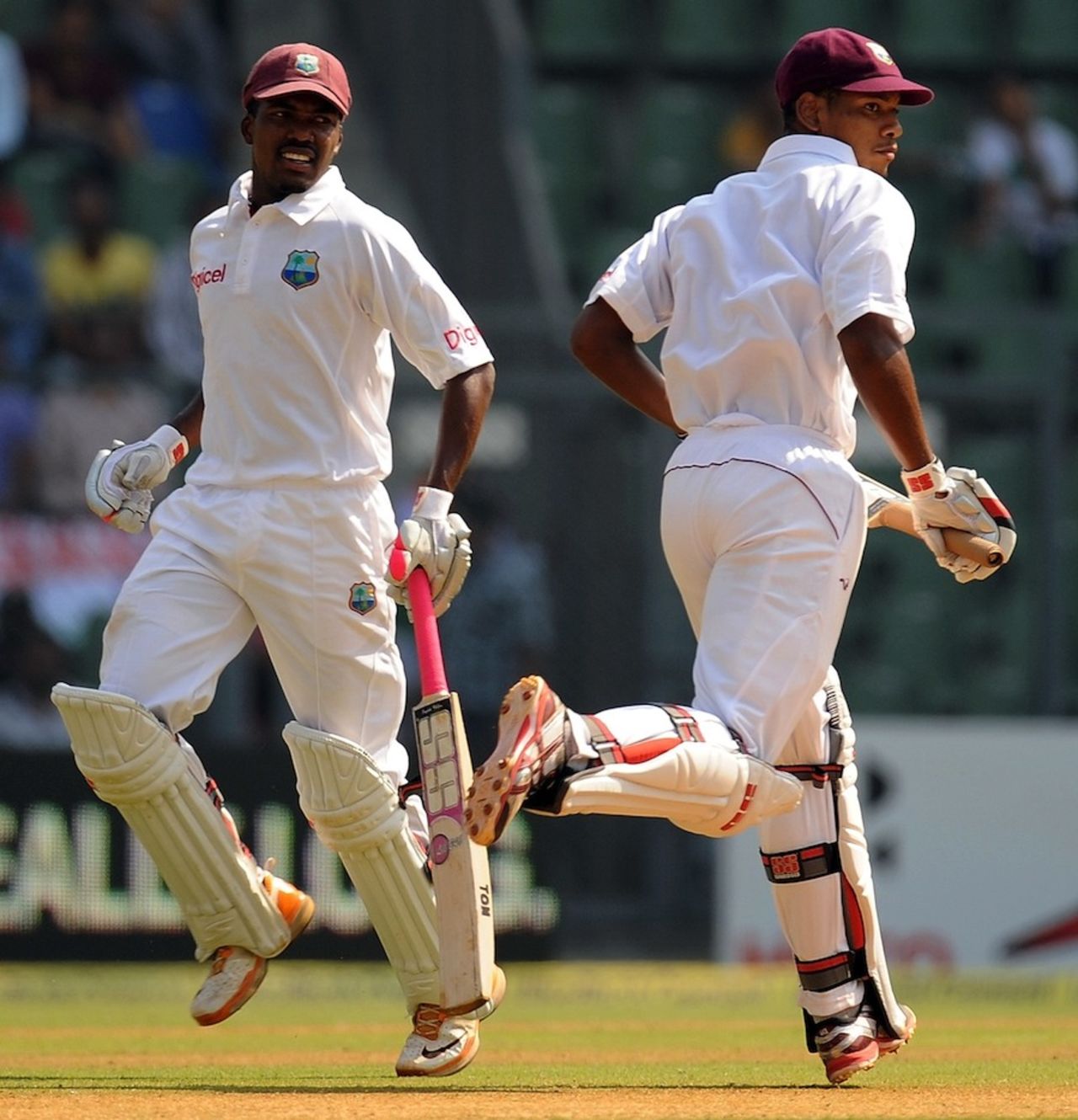 Darren Bravo and Kieran Powell run during their 160-run partnership, India v West Indies, 3rd Test, Mumbai, 2nd day, November 23, 2011