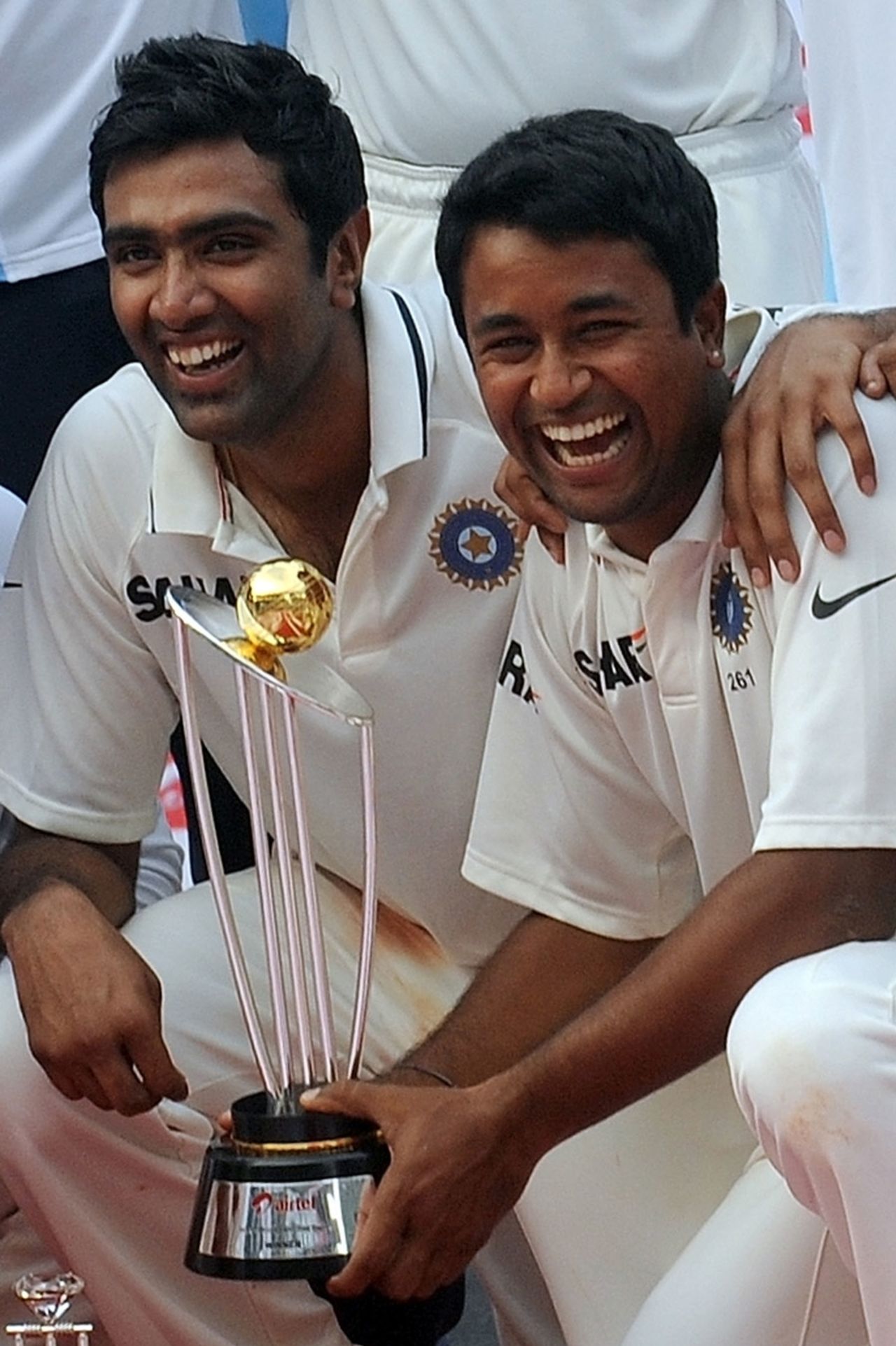 R Ashwin and Pragyan Ojha with the trophy, India v West Indies, 3rd Test, Mumbai, 5th day, November 26, 2011 