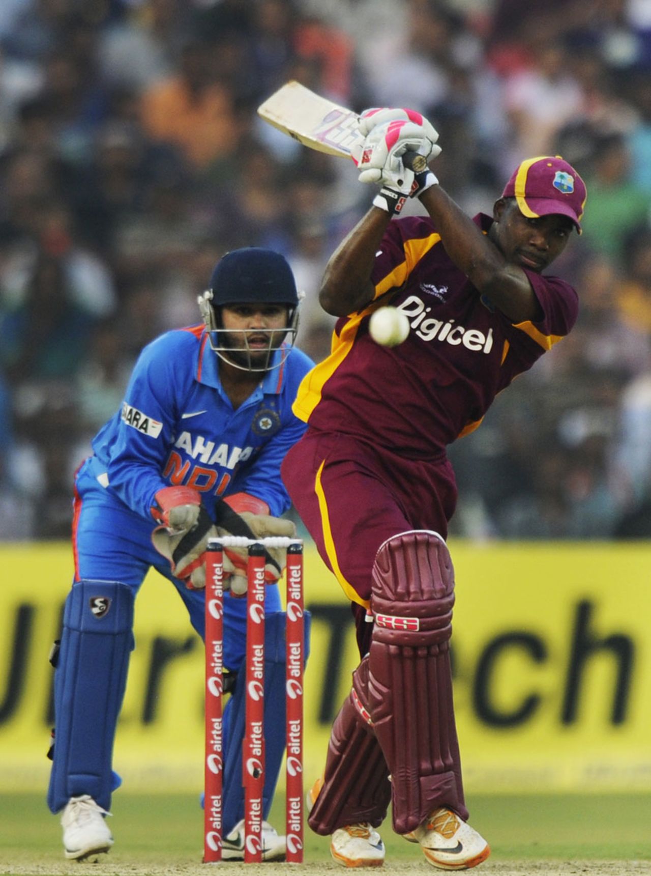 Darren Bravo hits down the ground during his half-century, India v West Indies, 1st ODI, Cuttack, November 29, 2011