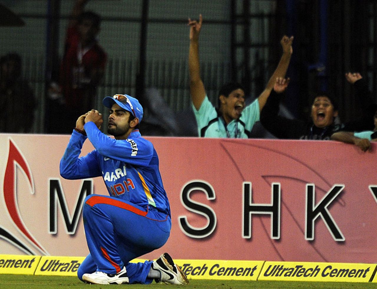 Virat Kohli takes a catch to dismiss Kieron Pollard, India v West Indies, 1st ODI, Cuttack, November 29, 2011