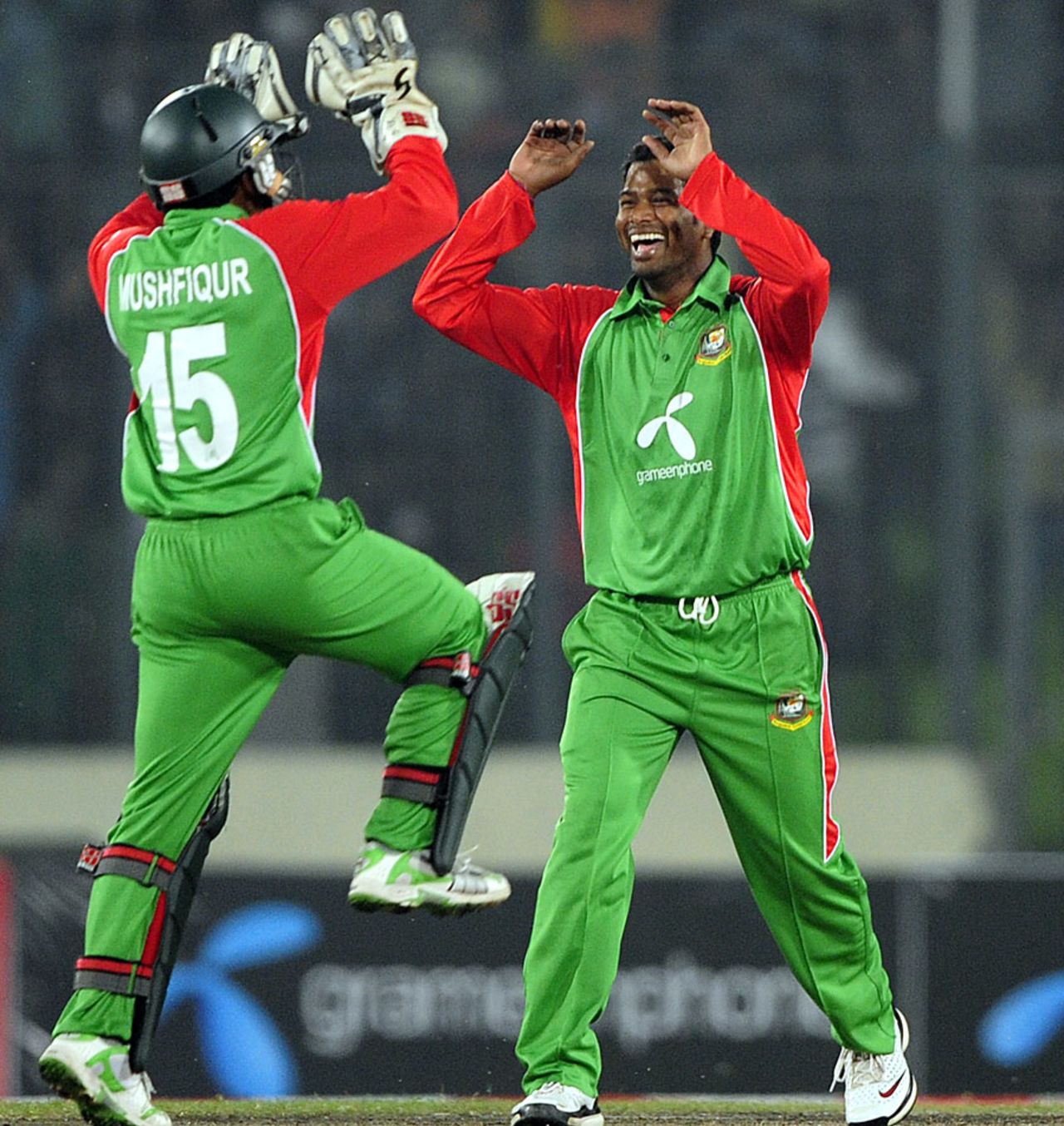 Mushfiqur Rahim and Alok Kapali celebrate another wicket, Bangladesh v Pakistan, only Twenty20, Mirpur, November 29, 2011