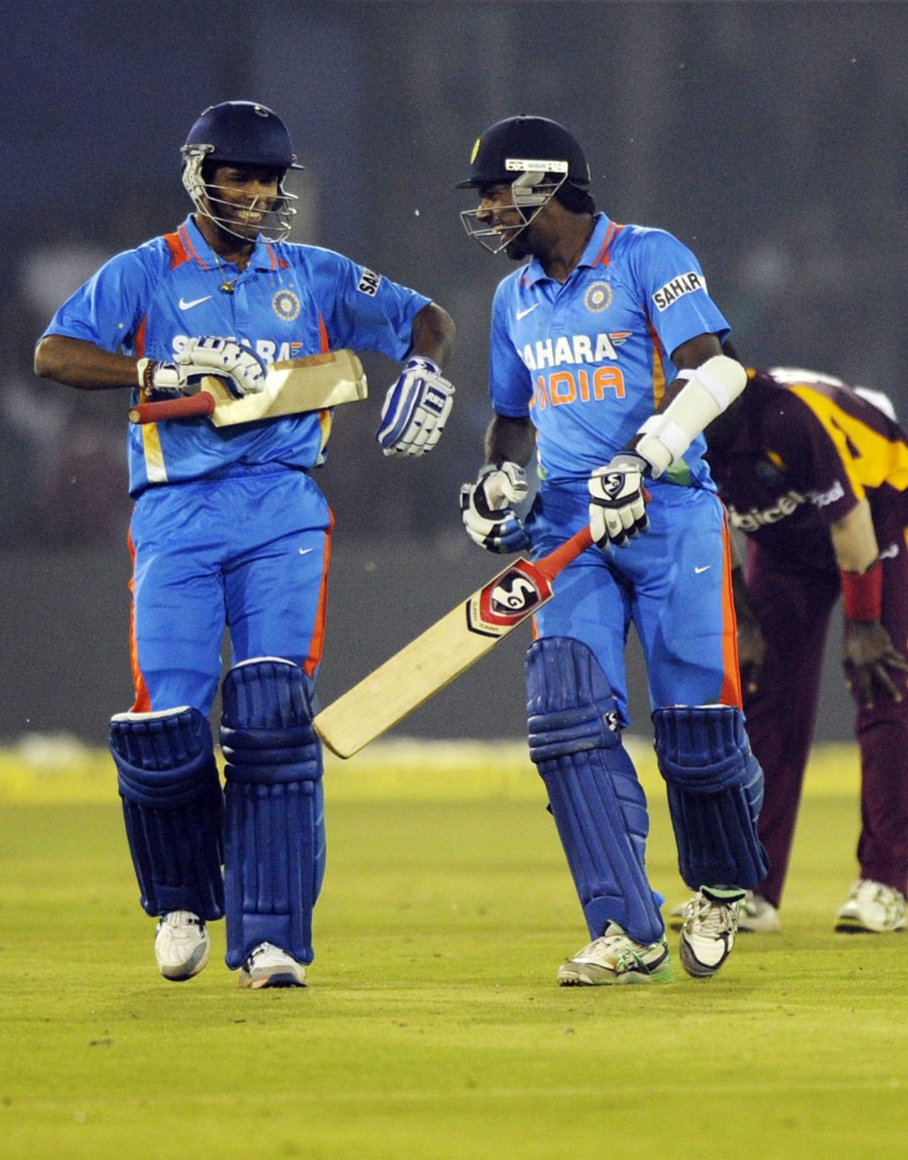 Umesh Yadav and Varun Aaron are all smiles after guiding India to a tense win, India v West Indies, 1st ODI, Cuttack, November 29, 2011
