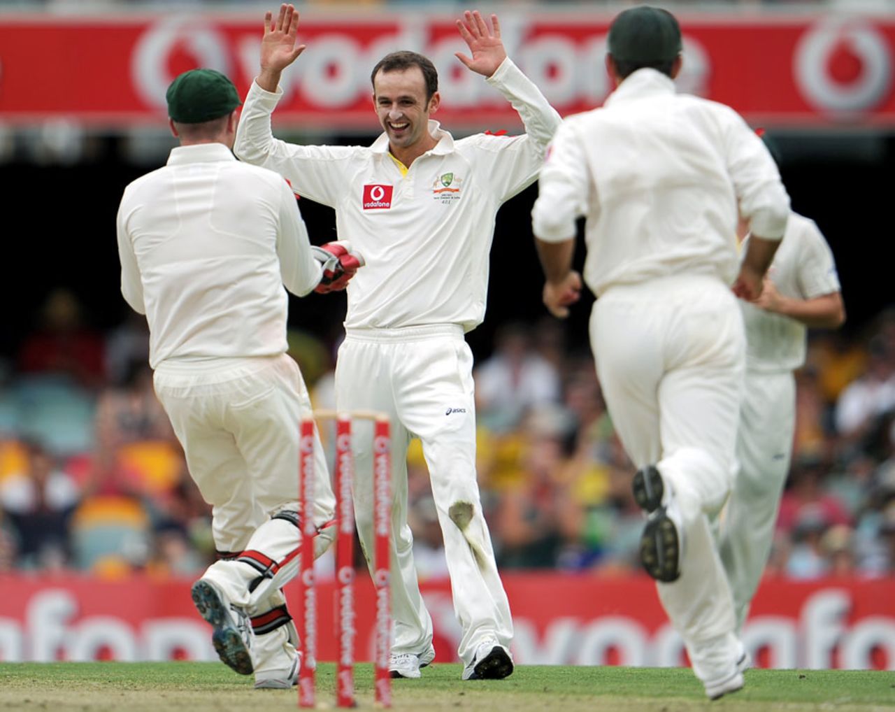 Nathan Lyon is congratulated after getting rid of Kane Williamson, Australia v New Zealand, 1st Test, Brisbane, 1st day, December 1, 2011
