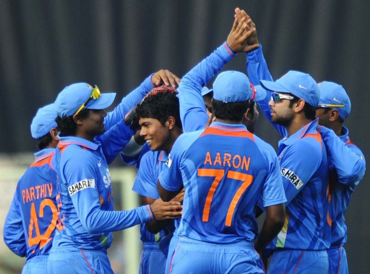 The Indians congratulate Umesh Yadav on striking early, India v West Indies, 2nd ODI, Visakhapatnam, December 2, 2011