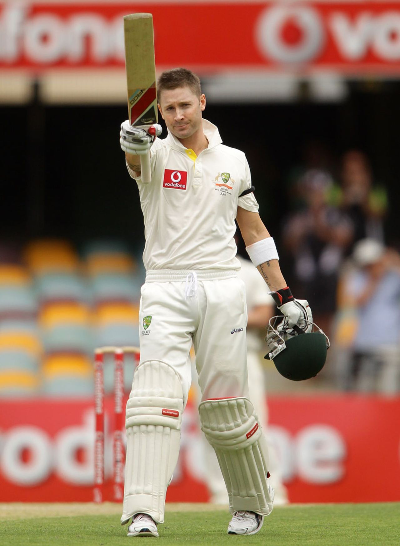 Michael Clarke raises his bat after reaching his hundred, Australia v New Zealand, 1st Test, Brisbane, 3rd day, December 3, 2011