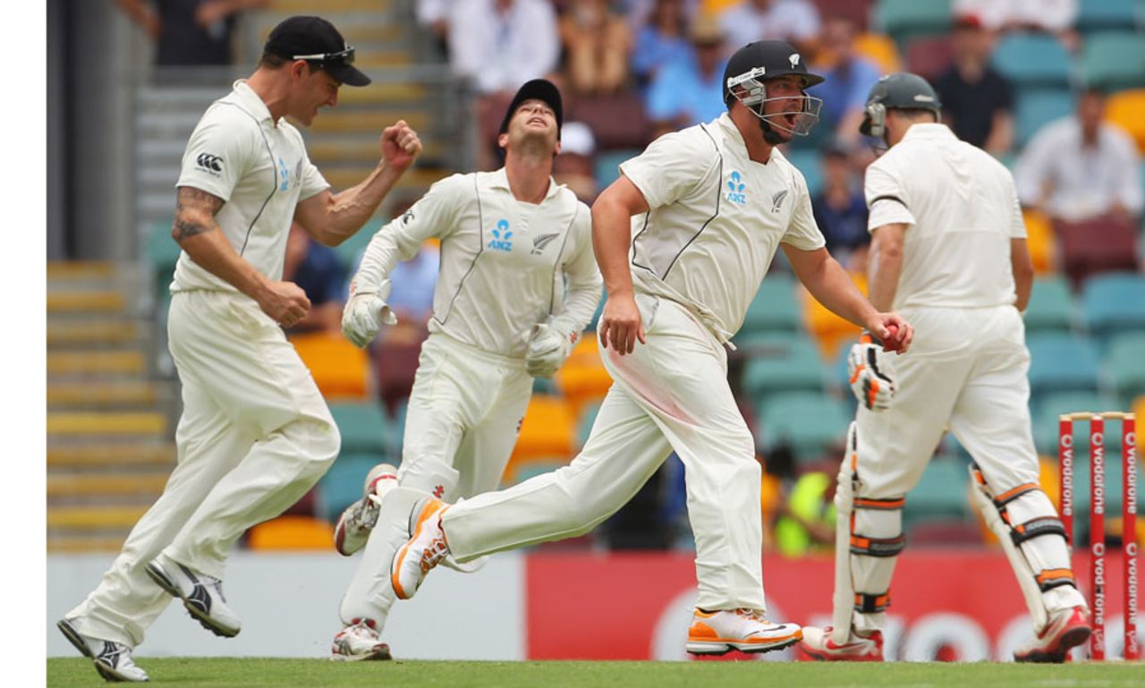 New Zealand celebrates after Jesse Ryder catches Michael Hussey, Australia v New Zealand, 1st Test, Brisbane, 3rd day, December 3, 2011