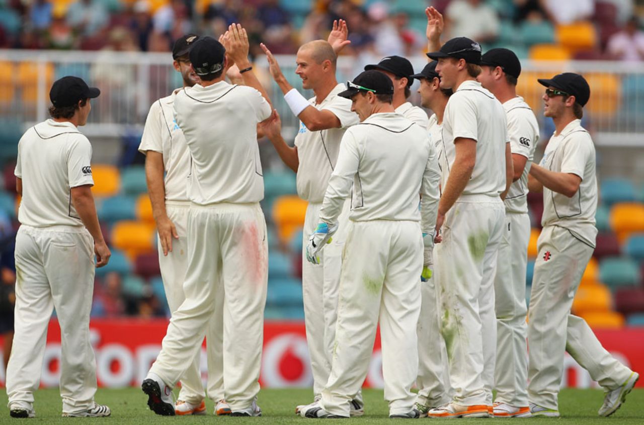 New Zealand celebrate the dismissal of Michael Clarke, Australia v New Zealand, 1st Test, Brisbane, 3rd day, December 3, 2011
