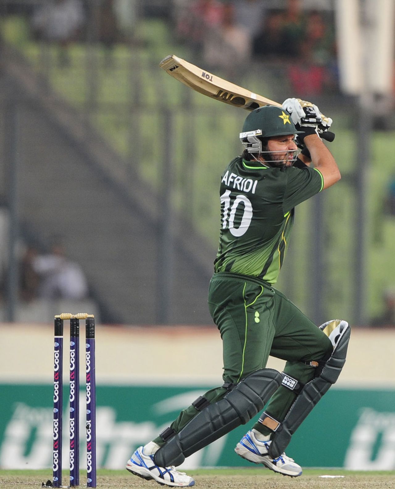 Shahid Afridi knocks one through the off side field, Bangladesh v Pakistan, 2nd ODI, Mirpur, December 3, 2011