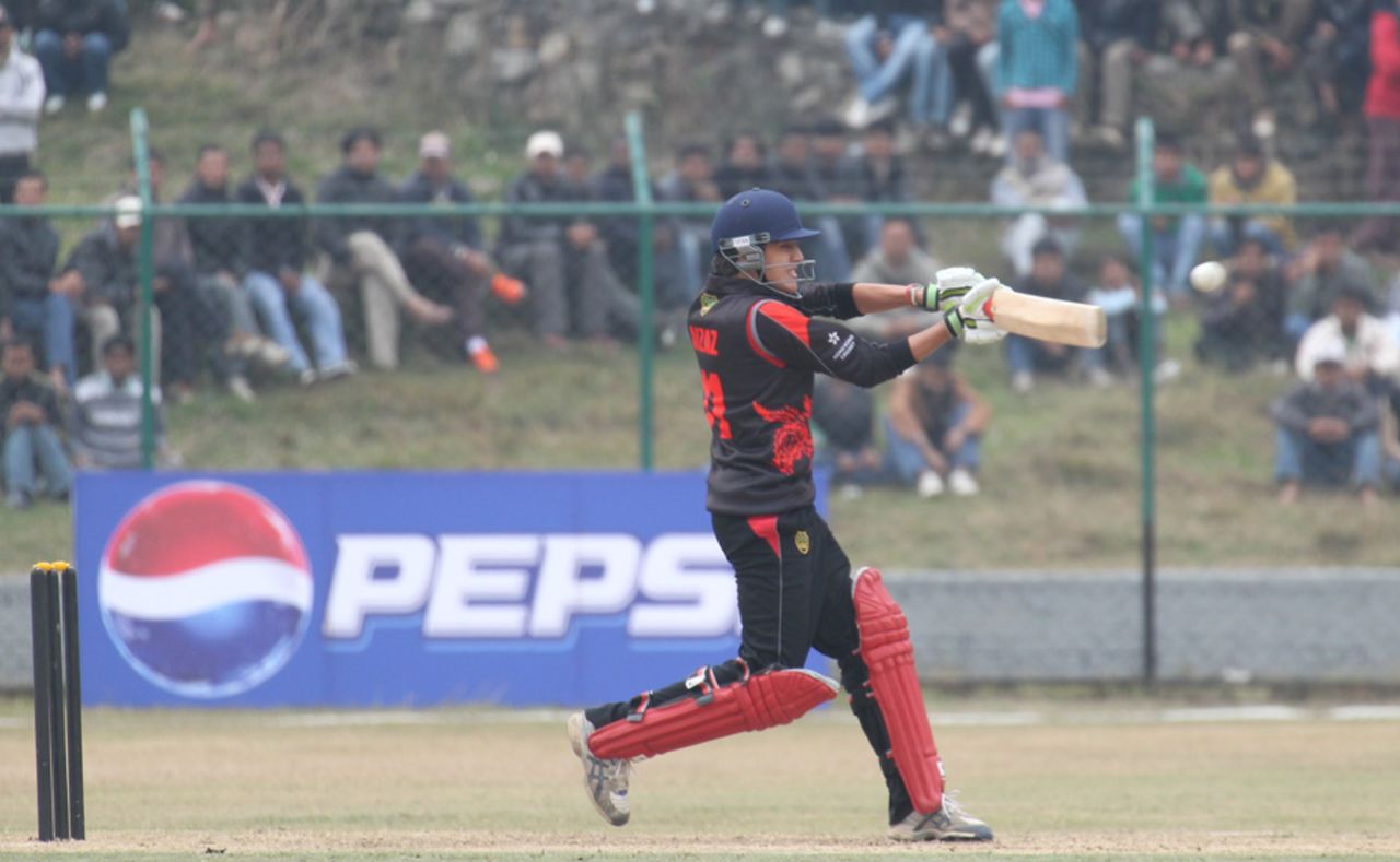 Aizaz Khan flat bats a six against Nepal during the ACC Twenty20 Cup 2011 match at the Tribhuvan University Ground in Kathmandu on 3rd December 2011