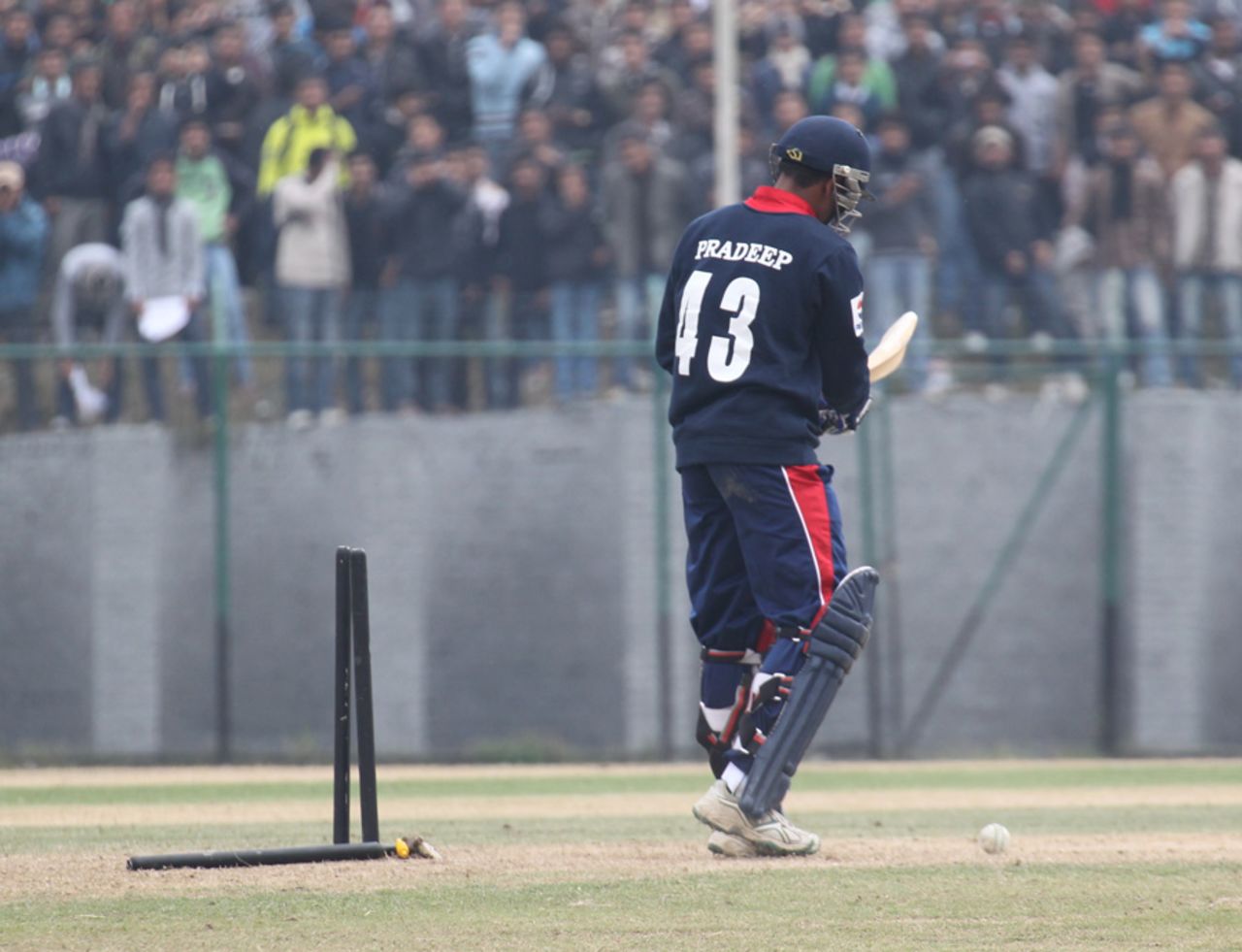 Nepal's Pradeep Airee has his stumps destroyed by Hong Kong's Irfan Ahmed on the opening day of the ACC Twenty20 Cup 2011 in Kathmandu on 3rd December 2011