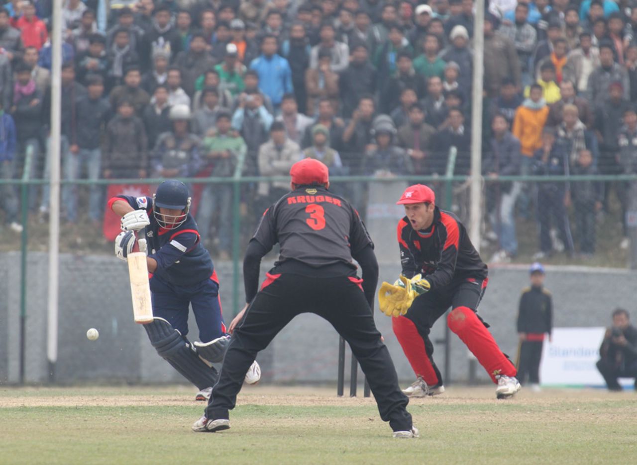 Rahul Vishvakarma hits the winning run off the final ball of the 20th over to secure victory for Nepal over Hong Kong at the ACC Twenty20 Cup 2011 at the Tribhuvan University Ground in Kathmandu on 3rd December 2011