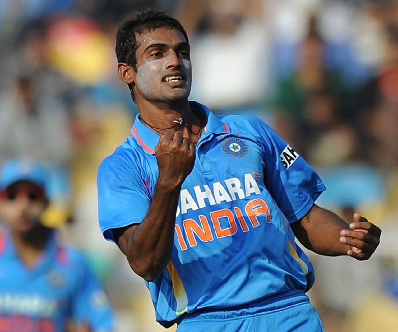 Abhimanyu Mithun pumps his fist after dismissing Danza Hyatt, India v West Indies, 3rd ODI, Ahmedabad, December 5, 2011