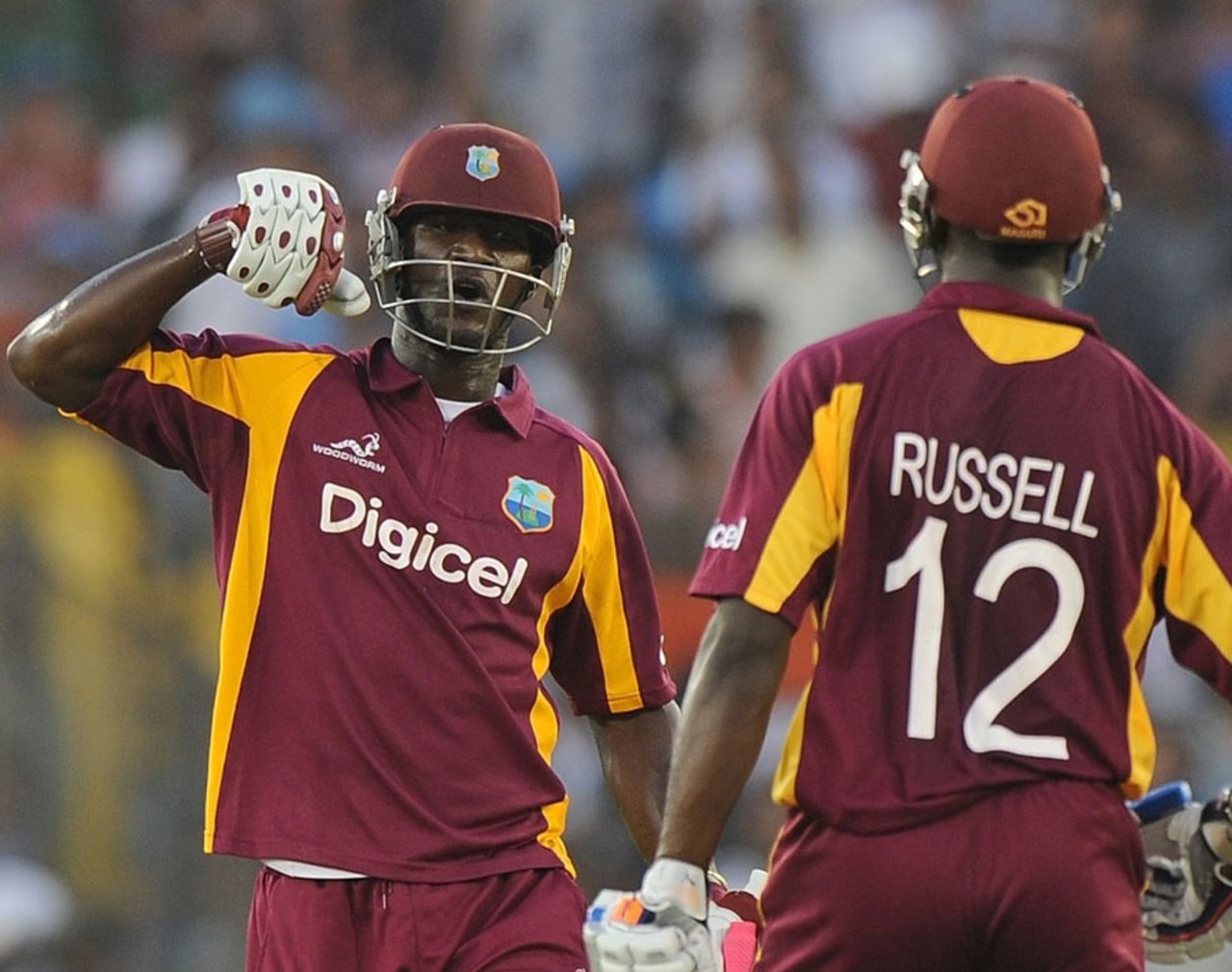 Darren Sammy and Andre Russell during their 79-run partnership, India v West Indies, 3rd ODI, Ahmedabad, December 5, 2011