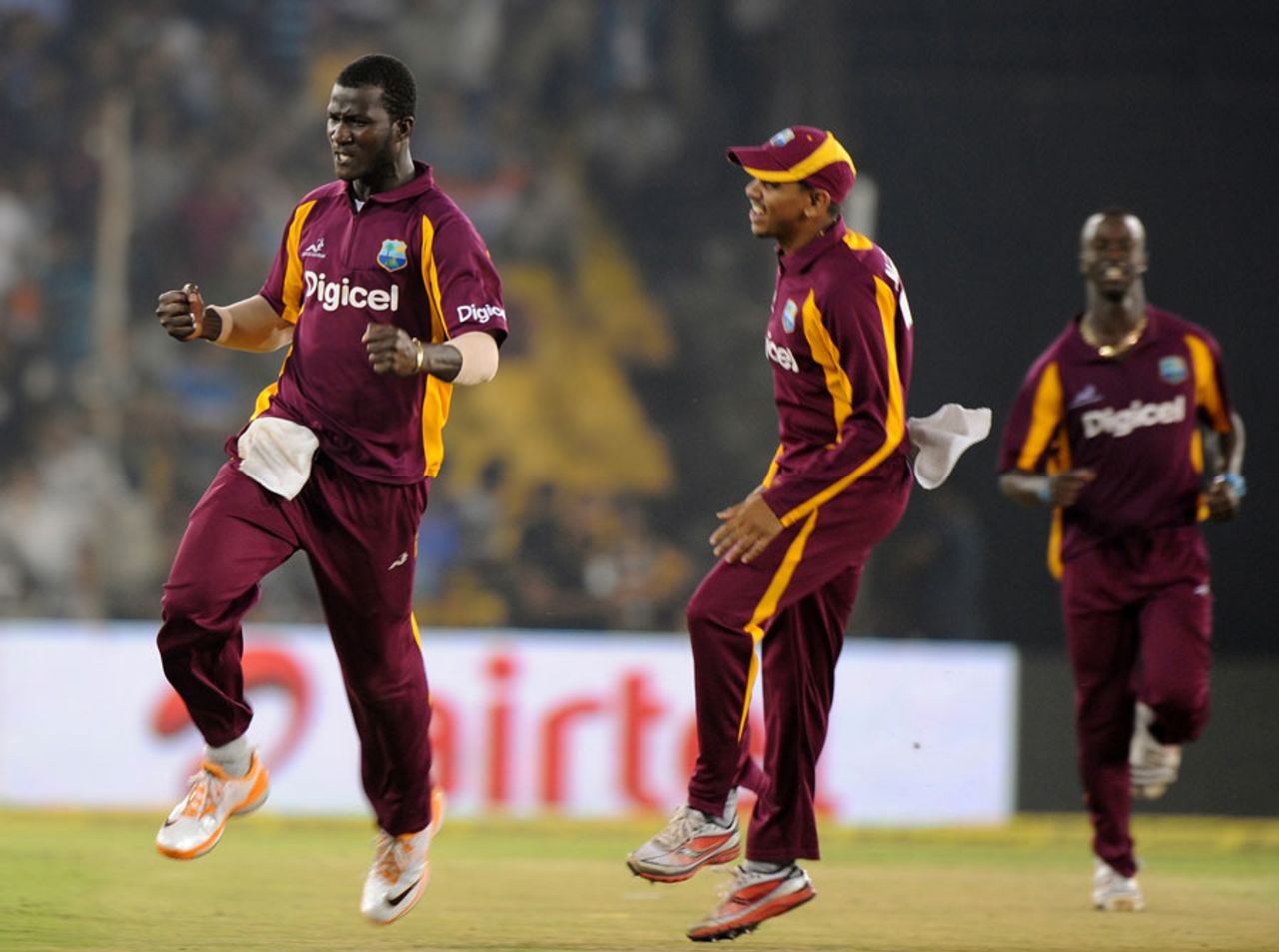 Darren Sammy is pumped up after effecting Rohit Sharma's run out, India v West Indies, 3rd ODI, Ahmedabad, December 5, 2011