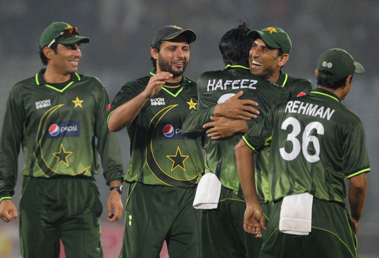 Mohammad Hafeez celebrates with his team-mates after taking a wicket, Bangladesh v Pakistan, 3rd ODI, Chittagong, December 6, 2011 