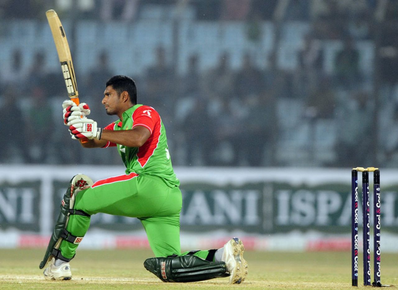 Mahmudullah plays the slog-sweep, Bangladesh v Pakistan, 3rd ODI, Chittagong, December 6, 2011 