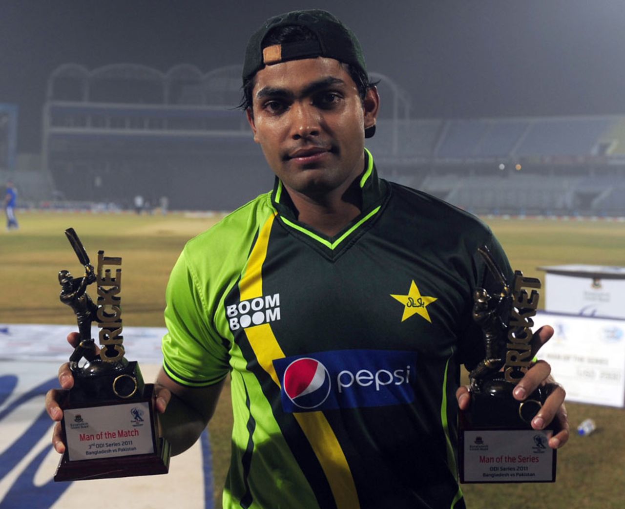 Umar Akmal with the Man of the Match and Man of the Series trophies, Bangladesh v Pakistan, 3rd ODI, Chittagong, December 6, 2011 