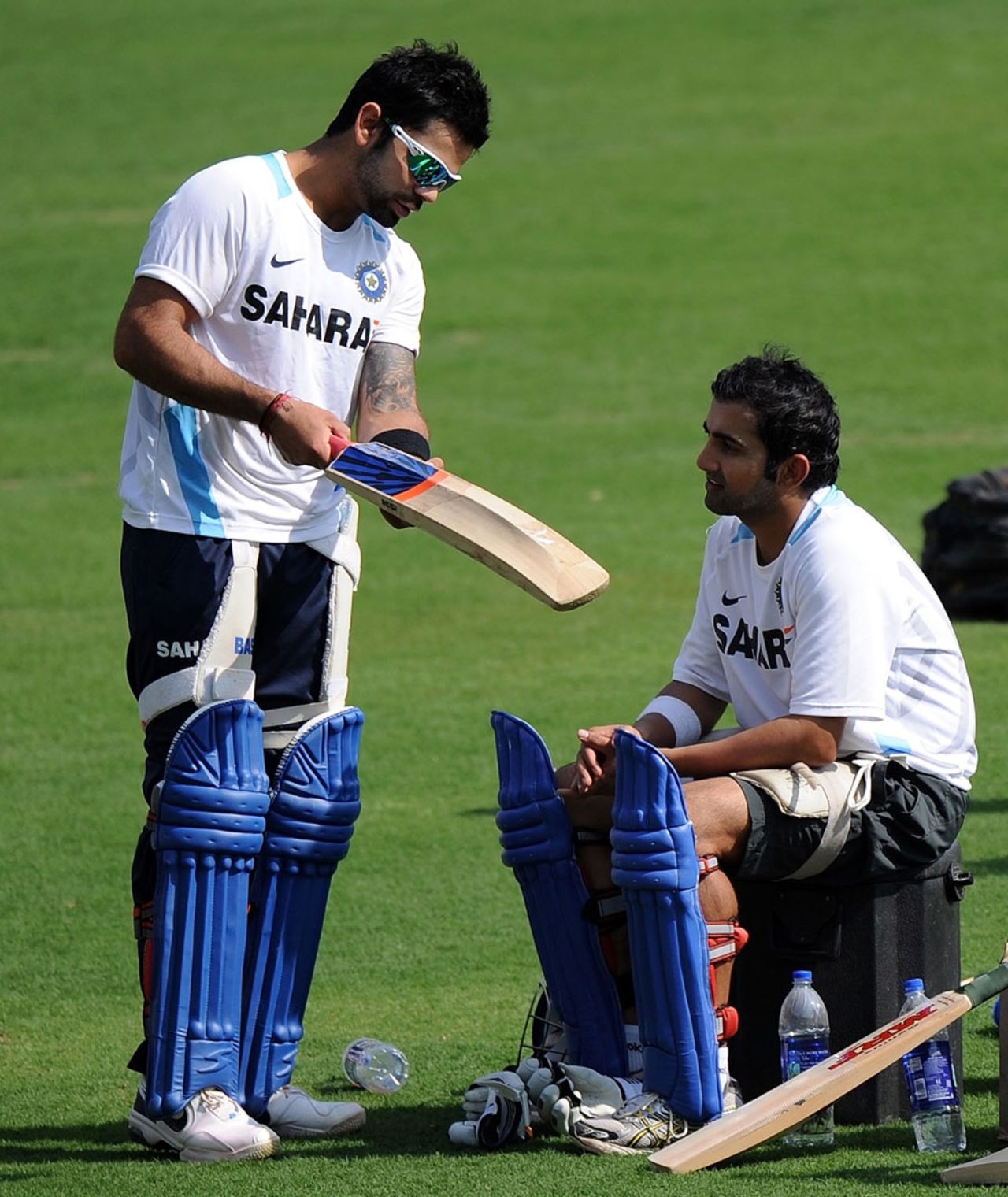Virat Kohli has a chat with Gautam Gambhir during practice, Indore, December 7, 2011