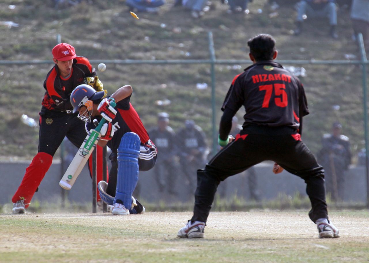 Nizakat Khan gets his revenge as he bowls Kuwait's Mohammad Irfan at the ACC Twenty20 Cup 2011 in Kathmandu on 7th December 2011