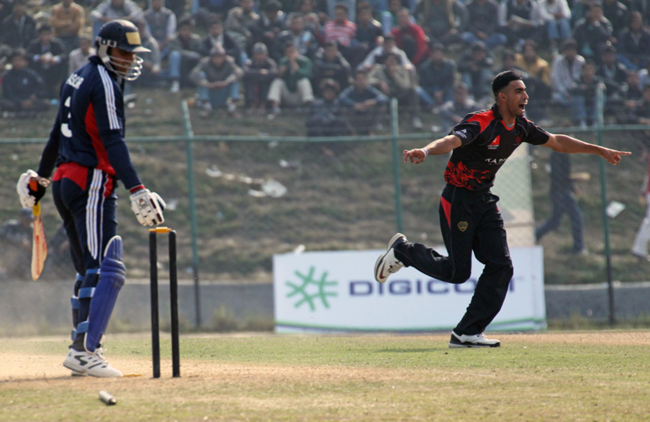 Irfan Ahmed celebrates the wicket of Kuwait's Mohammed Asghar at the ACC Twenty20 Cup 2011 in Kathmandu on 7th December 2011