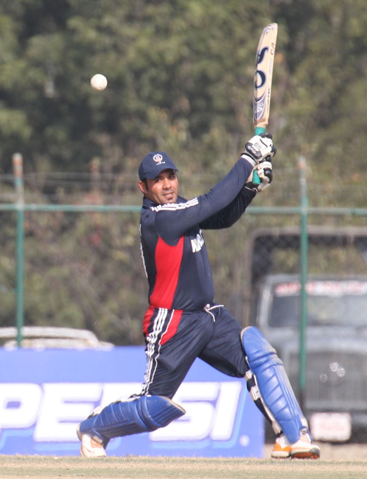 Kuwait's Abdullah Akhunzada lofts the ball square against Hong Kong during the ACC Twenty20 Cup 2011 in Kathmandu on 7th December 2011