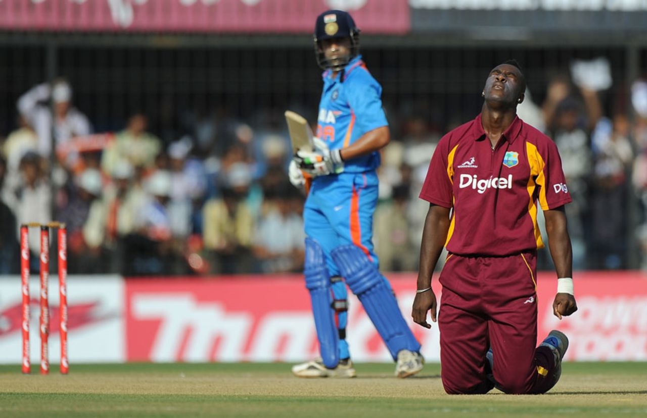 Andre Russell reacts after dropping Gautam Gambhir, India v West Indies, 4th ODI, Indore, December 8, 2011
