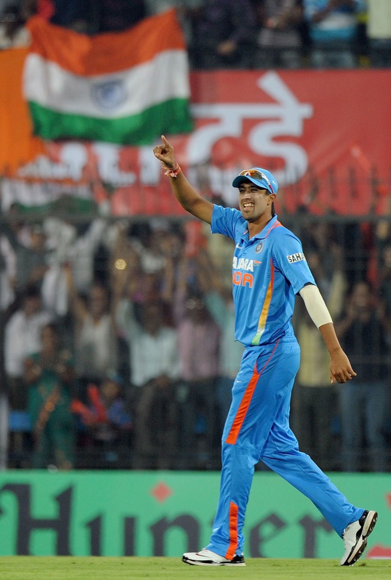 Rahul Sharma is all smiles during a successful debut, India v West Indies, 4th ODI, Indore, December 8, 2011
