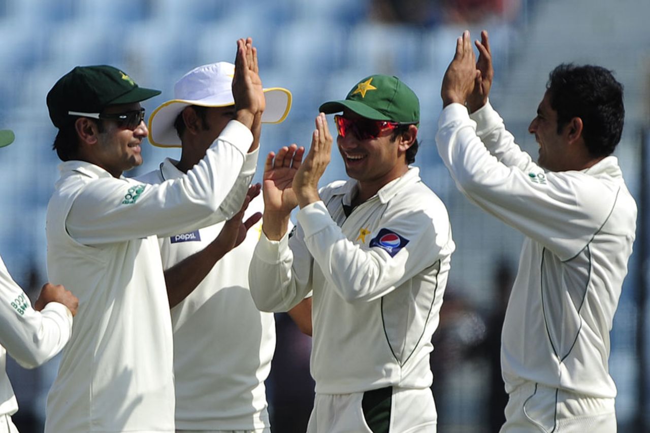 Saeed Ajmal and Abdur Rehman picked up three wickets apiece, Bangladesh v Pakistan, 1st Test, Chittagong, 1st day, December 9, 2011 
