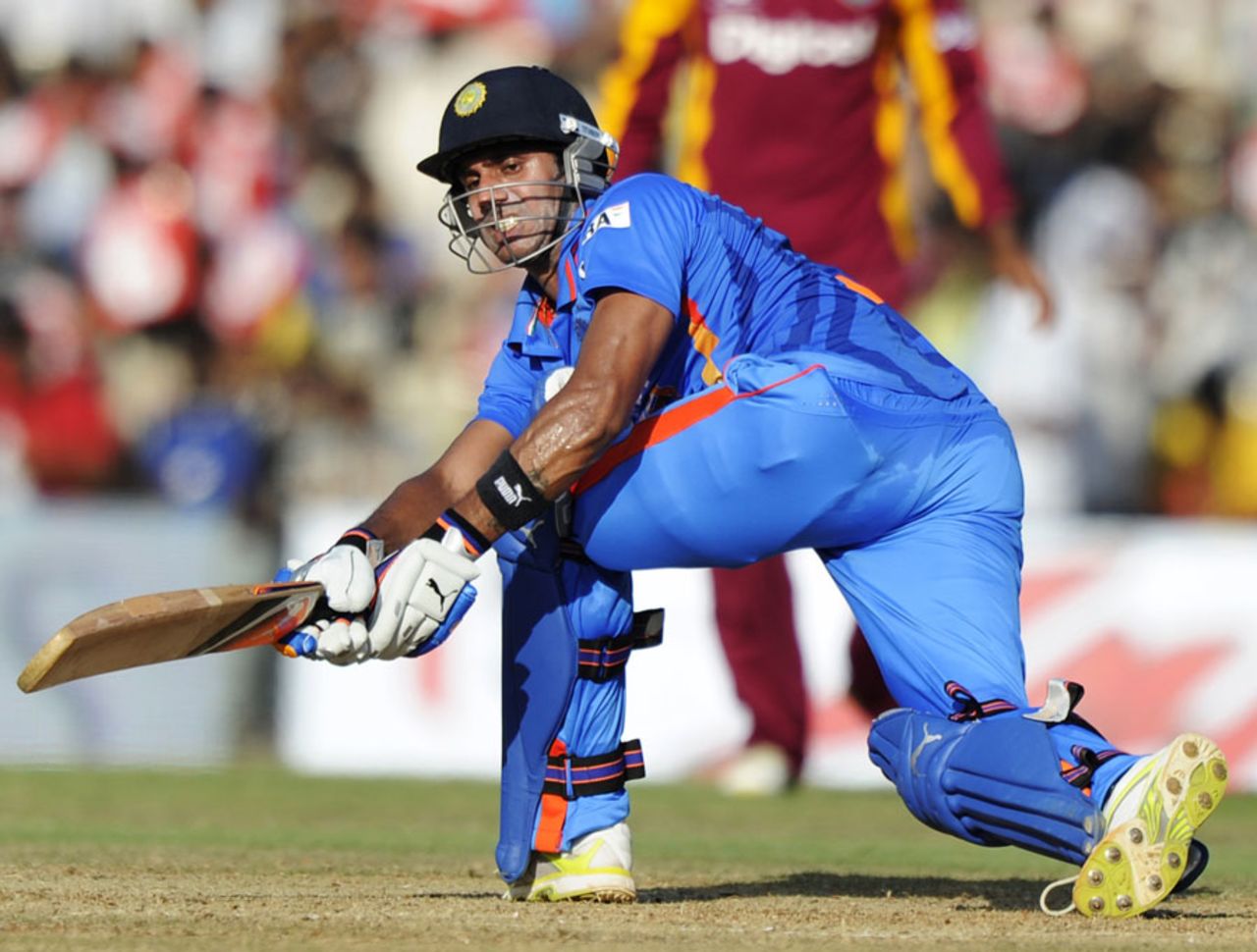 Manoj Tiwary plays a sweep, India v West Indies, 5th ODI, Chennai, December 11, 2011