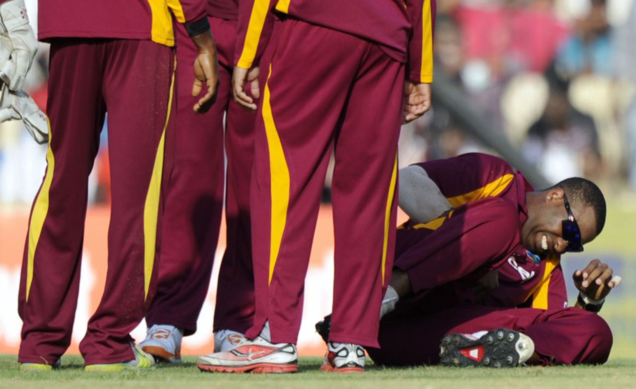 Kieron Pollard hurt his abdomen while fielding, India v West Indies, 5th ODI, Chennai, December 11, 2011