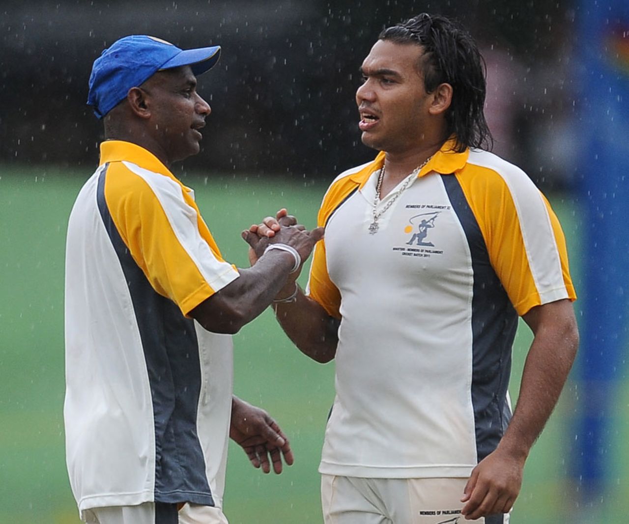 Sanath Jayasuriya and Namal Rajapaksa during a match between parliamentarians, Colombo, December 11, 2011 