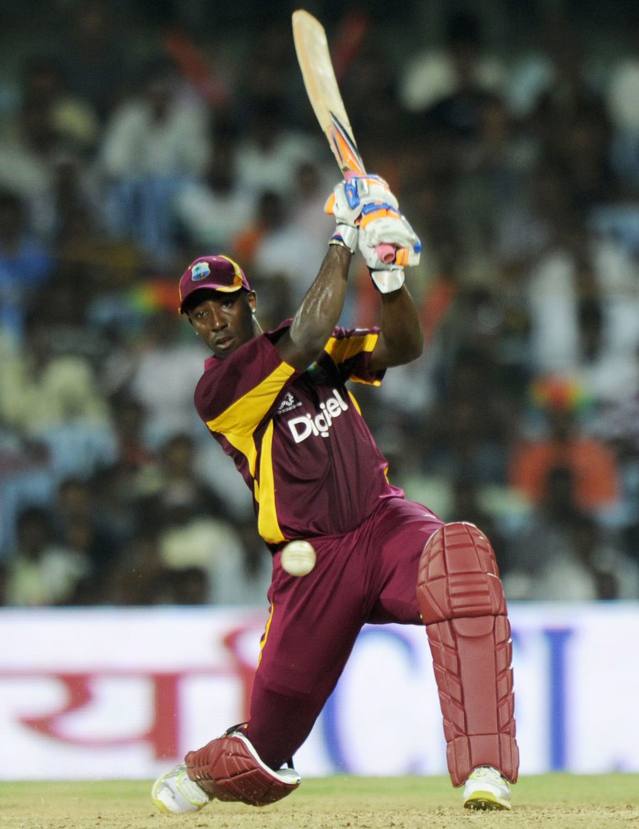 Andre Russell slams one through the off side, India v West Indies, 5th ODI, Chennai, December 11, 2011