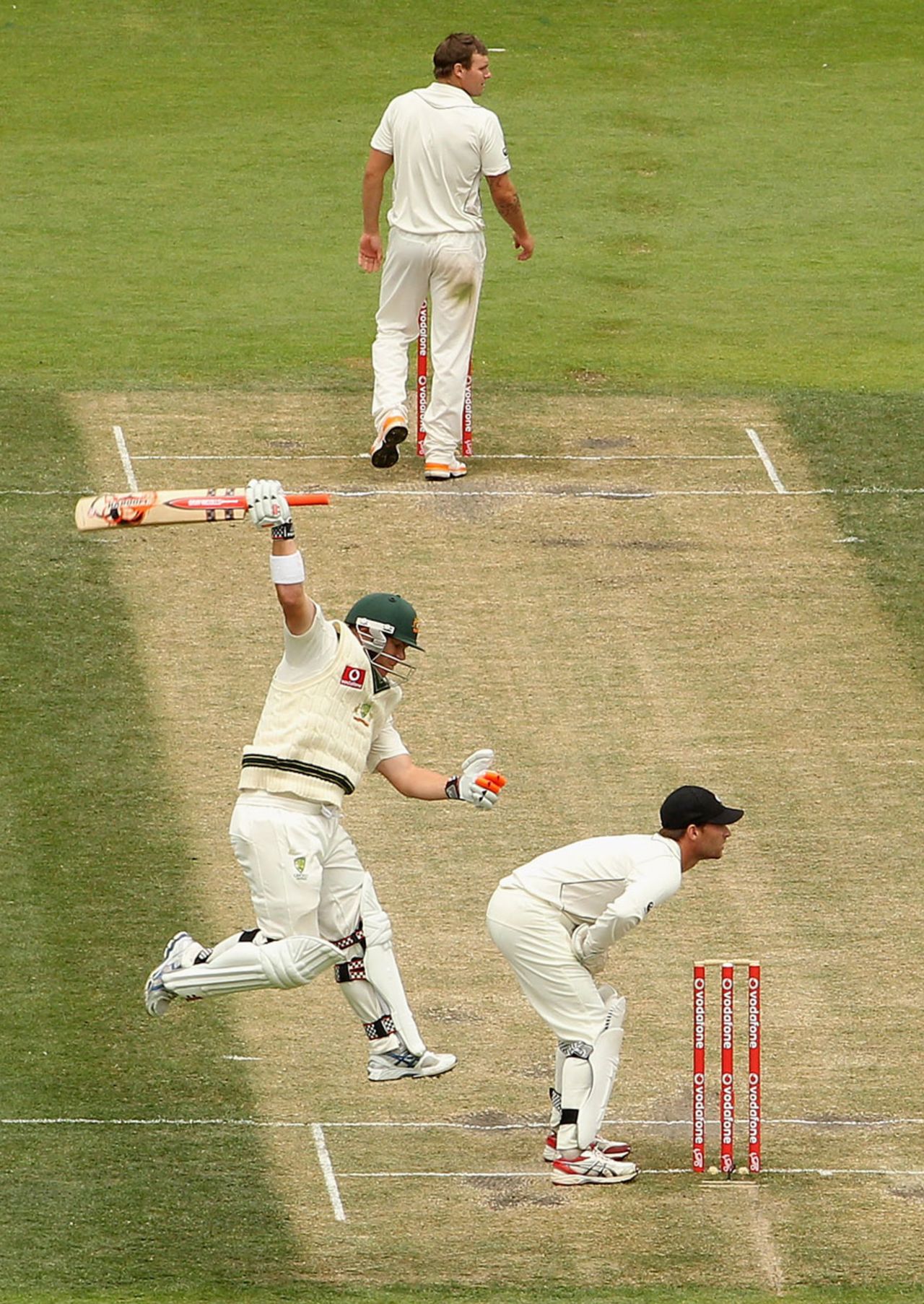 David Warner leaps for joy after reaching his century, Australia v New Zealand, 2nd Test, Hobart, 4th day, December 12 2011
