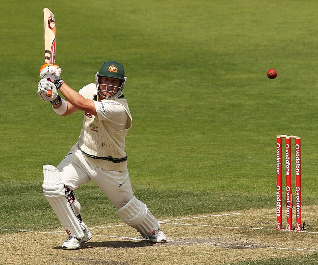 David Warner plays a lofted drive, Australia v New Zealand, 2nd Test, Hobart, 4th day, December 12 2011