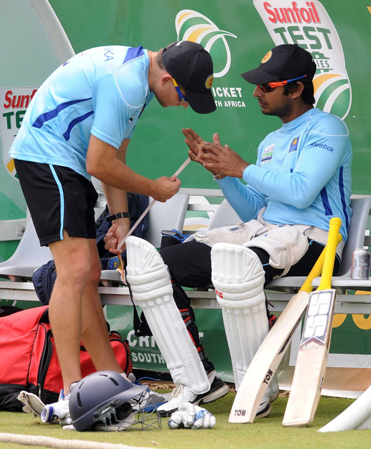 Kumar Sangakkara gets his injured hand tapped up, Centurion, December 14, 2011