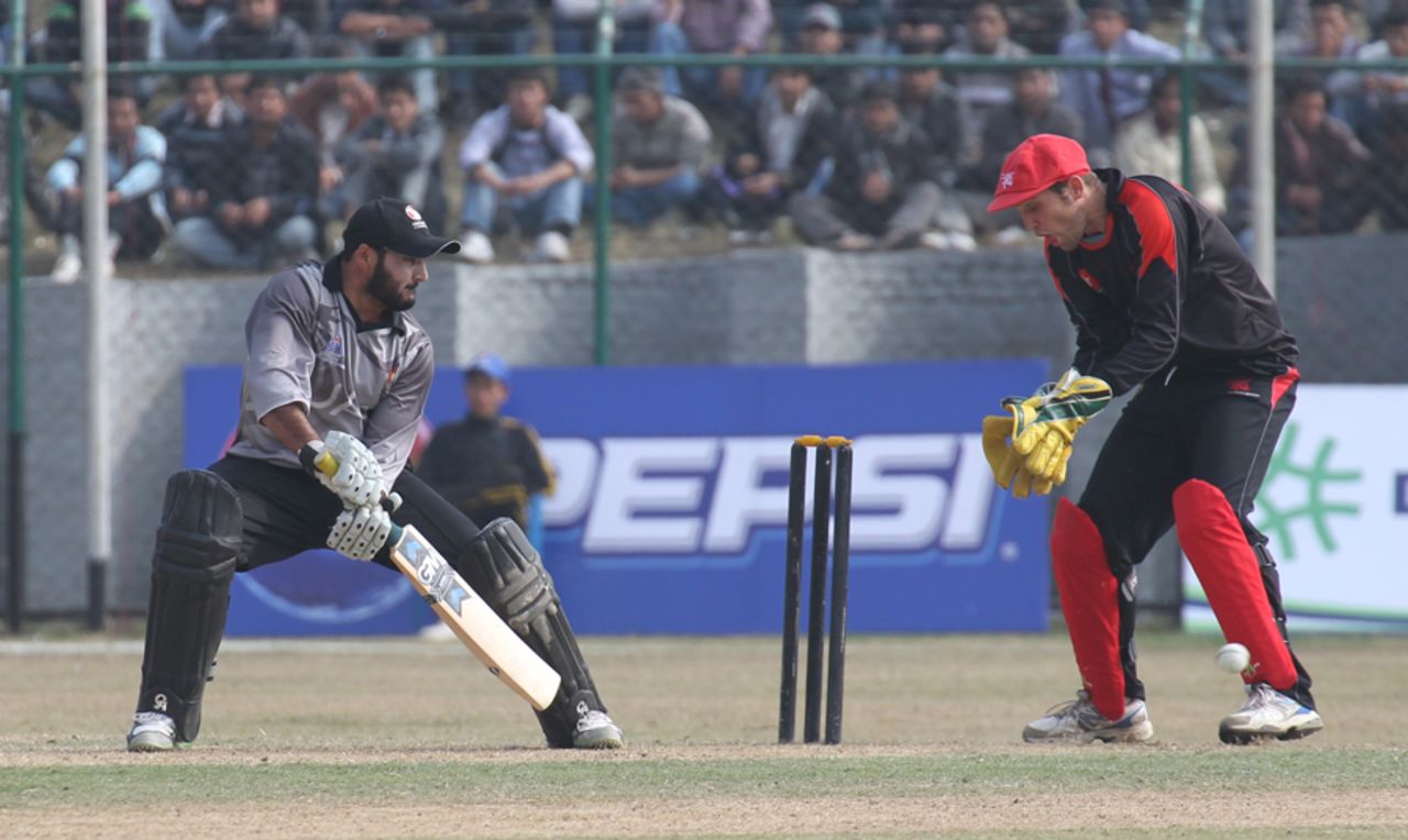 UAE's Amjad Ali taps the ball past the keeper during his 79* against Hong Kong at the ACC Twenty20 Cup 2011 in Kathmandu on 6th December 2011