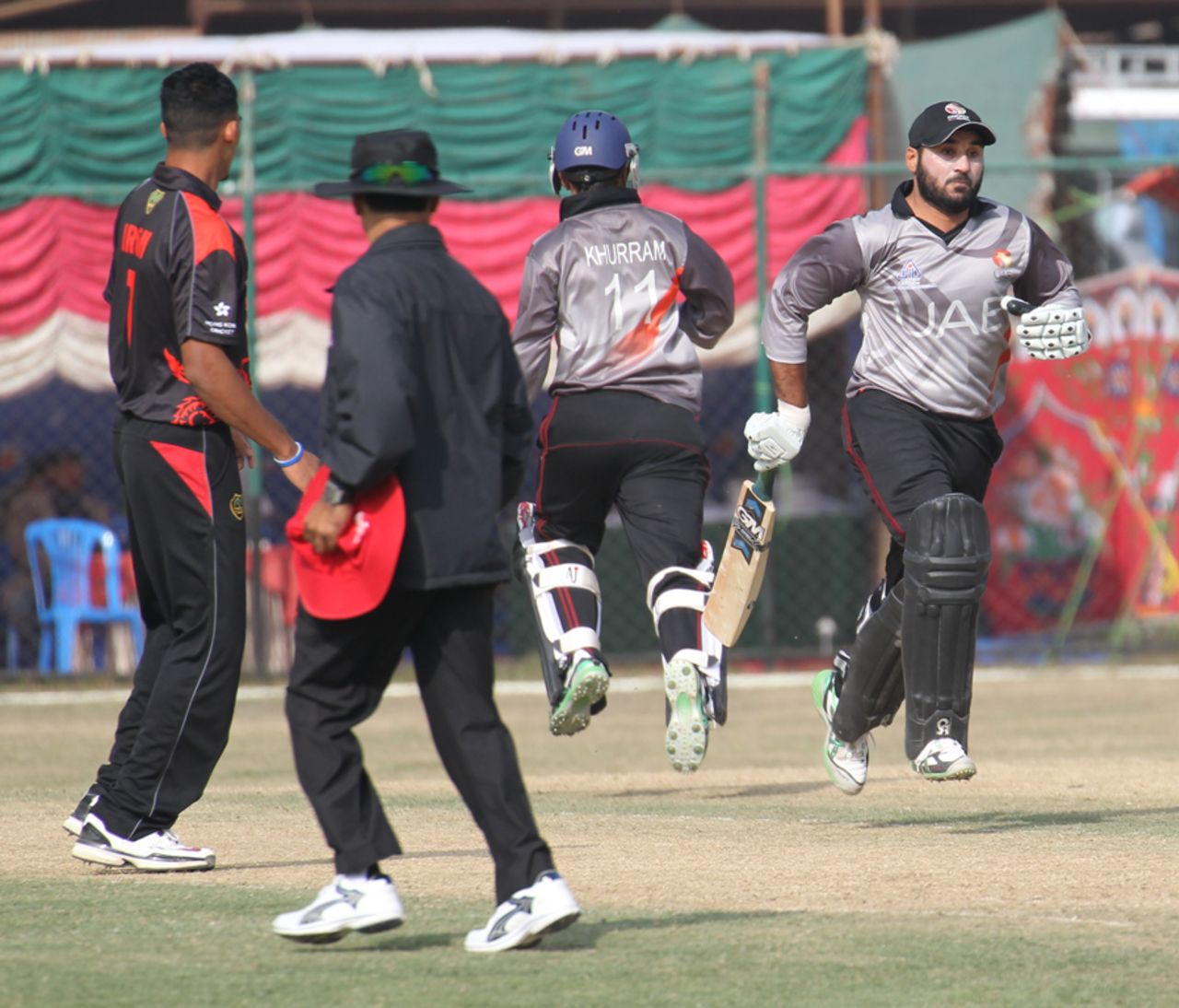 UAE's Khurram Khan and Amjad Ali shard in a partnership worth 40 runs against Hong Kong at the ACC Twenty20 Cup 2011 in Kathmandu on 6th December 2011