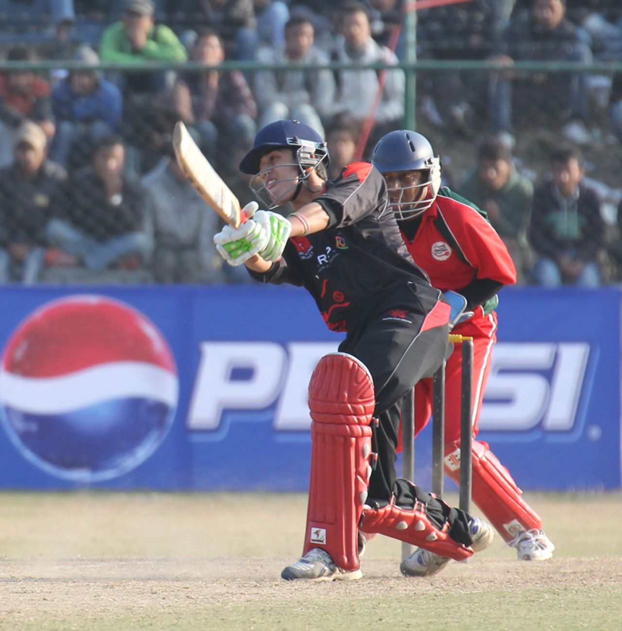 Aizaz Khan strokes a boundary during the ACC Twenty20 Cup 2011 semi-final against Oman at Kathmandu on 9th December 2011