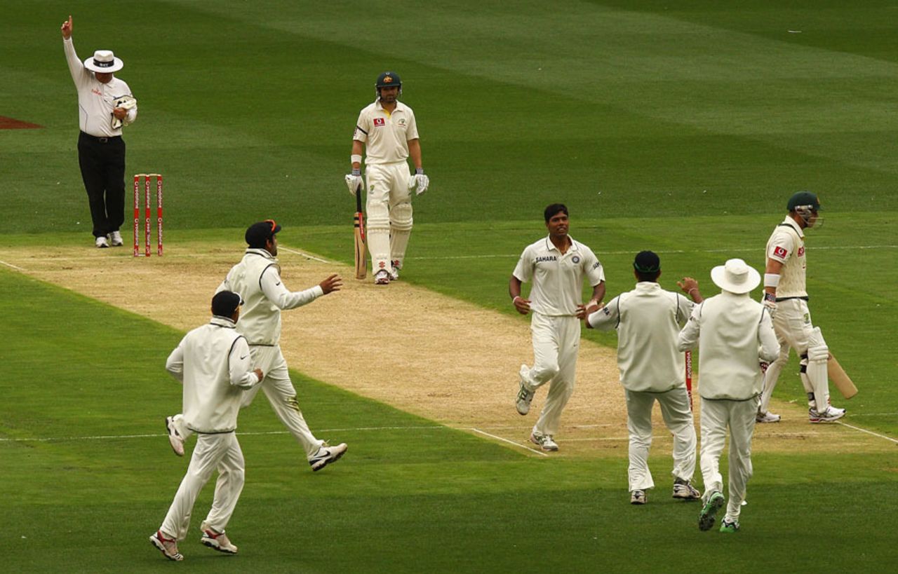 India celebrate David Warner's dismissal, Australia v India, 1st Test, Melbourne, 1st day, December 26, 2011