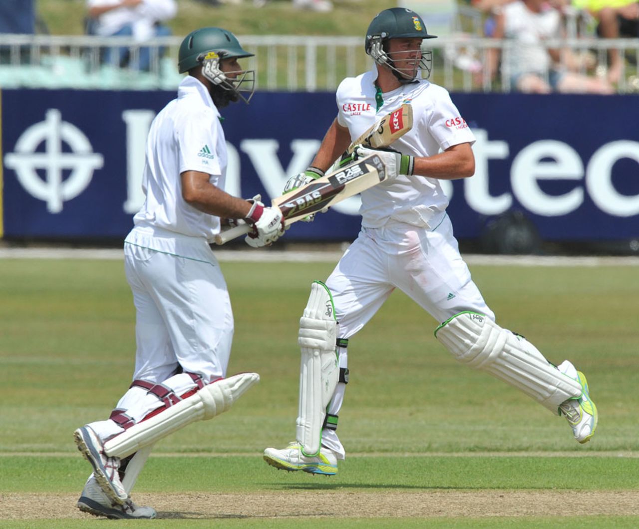 Hashim Amla and AB de Villiers during their 76-run stand, South Africa v Sri Lanka, 2nd Test, Durban, 2nd day, December 27, 2011