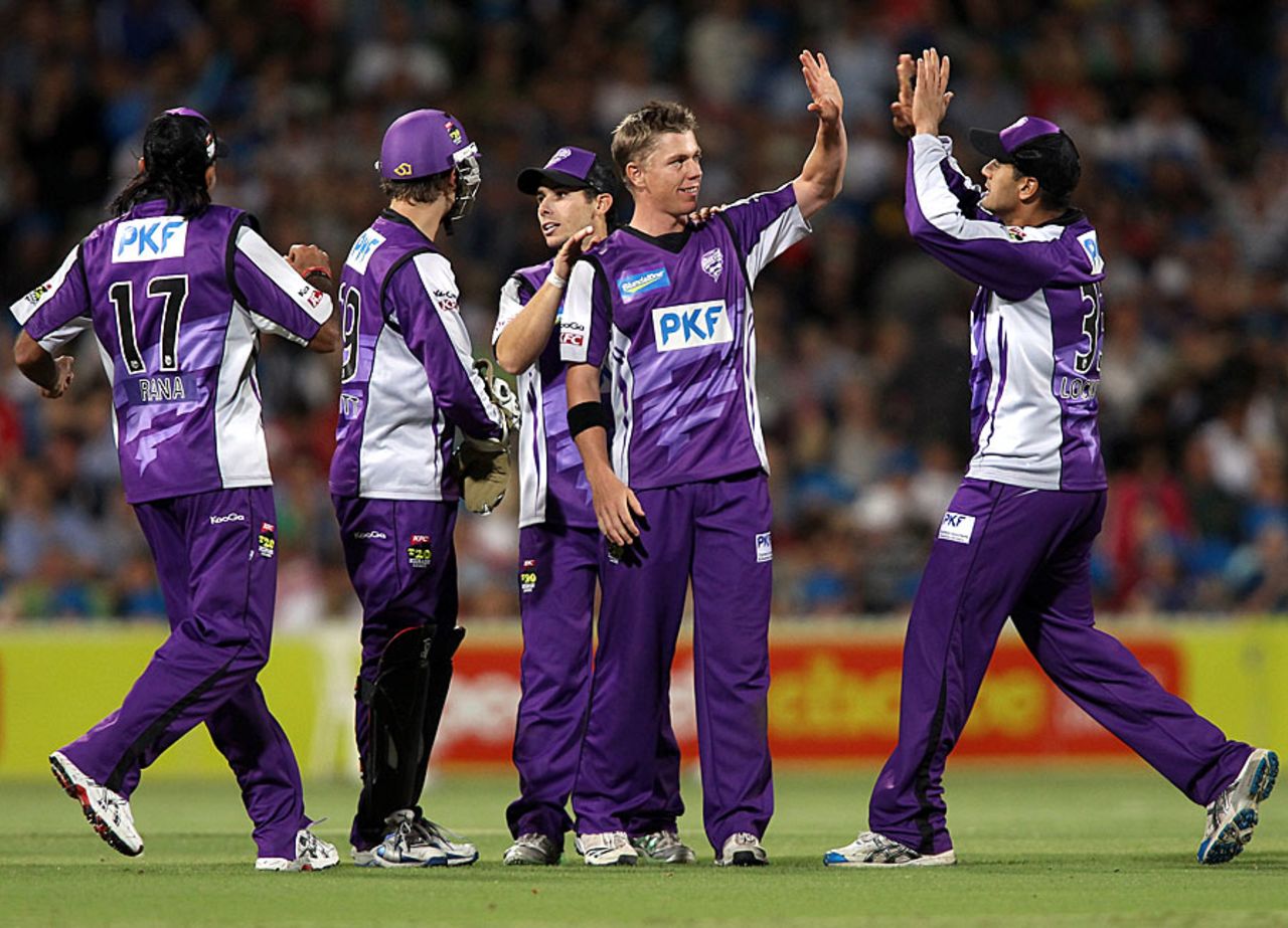 Xavier Doherty and his Hobart team-mates celebrate a wicket, Adelaide Strikers v Hobart Hurricanes, BBL, Adelaide, December 28, 2011